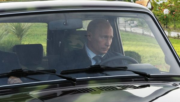 Vladimir Putin driving a Niva SUV in Sochi Vladimir Putin driving a Niva SUV in Sochi - Sputnik International