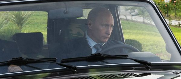 Vladimir Putin driving a Niva SUV in Sochi - Sputnik International