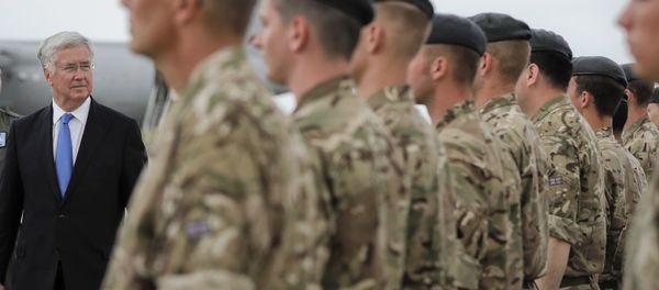 Britain's defense minister Michael Fallon reviews British military personnel at the Mihail Kogalniceanu air base, Romania, Wednesday, June 14, 2017. Britain's defense minister Michael Fallon reviews British military personnel at the Mihail Kogalniceanu air base, Romania, Wednesday, June 14, 2017. - Sputnik International