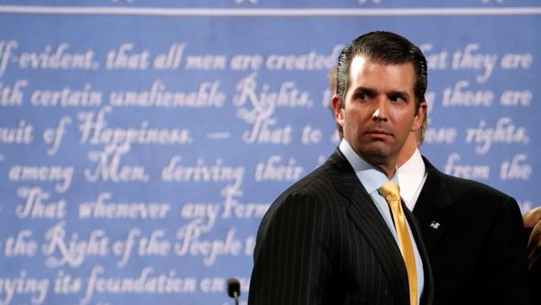 Donald Trump Jr. stands onstage with his father Republican U.S. presidential nominee Donald Trump after Trump's debate against Democratic nominee Hillary Clinton at Hofstra University in Hempstead, New York, U.S. September 26, 2016. - Sputnik International