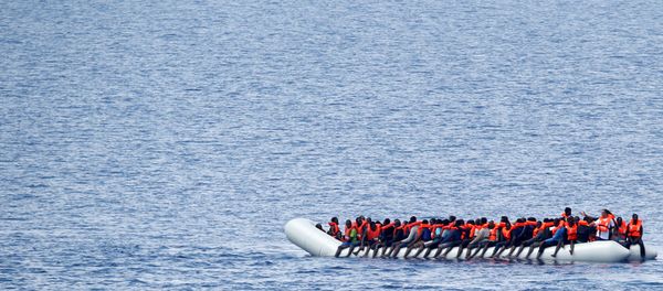 Migrants wait to be rescued by Save the Children NGO crew in the Mediterranean sea off Libya coast, June 18, 2017. Migrants wait to be rescued by Save the Children NGO crew in the Mediterranean sea off Libya coast, June 18, 2017. - Sputnik International