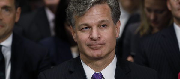Christopher Wray is seated prior to testifying before a Senate Judiciary Committee confirmation hearing on his nomination to be the next FBI director on Capitol Hill in Washington, U.S., July 12, 2017. Christopher Wray is seated prior to testifying before a Senate Judiciary Committee confirmation hearing on his nomination to be the next FBI director on Capitol Hill in Washington, U.S., July 12, 2017. - Sputnik International