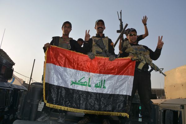 Iraqi security forces celebrate as Prime Minister Haider al-Abadi announces victory over Islamic State in Mosul, in Mosul, Iraq July 10, 2017. Iraqi security forces celebrate as Prime Minister Haider al-Abadi announces victory over Islamic State in Mosul, in Mosul, Iraq July 10, 2017. - Sputnik International
