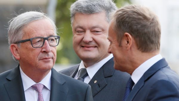 European Commission President Jean-Claude Juncker, Ukrainian President Petro Poroshenko and European Council President Donald Tusk walk before the EU-Ukraine summit in Kiev, Ukraine, July 13, 2017. European Commission President Jean-Claude Juncker, Ukrainian President Petro Poroshenko and European Council President Donald Tusk walk before the EU-Ukraine summit in Kiev, Ukraine, July 13, 2017. - Sputnik International