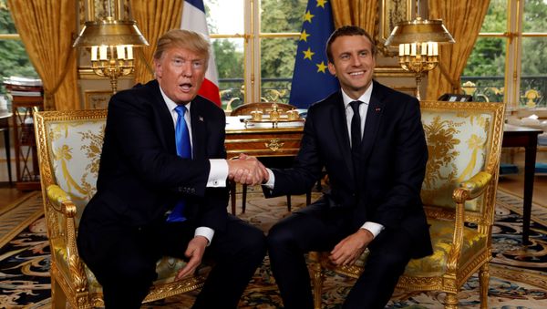 French President Emmanuel Macron and U.S. President Donald Trump (L) shake hands as they meet at the Elysee Palace in Paris, France, July 13, 2017. French President Emmanuel Macron and U.S. President Donald Trump (L) shake hands as they meet at the Elysee Palace in Paris, France, July 13, 2017. - Sputnik International