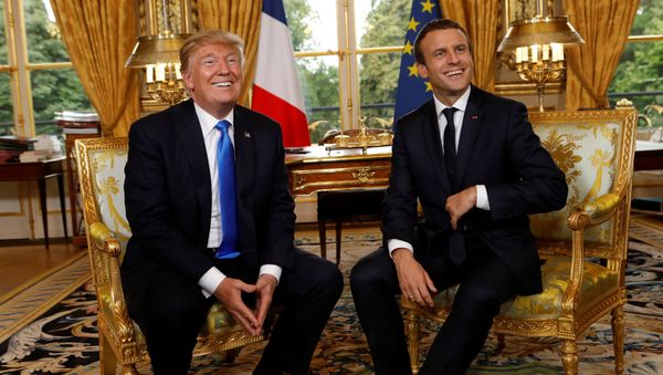 French President Emmanuel Macron and U.S. President Donald Trump (L) react as they meet at the Elysee Palace in Paris, France, July 13, 2017. French President Emmanuel Macron and U.S. President Donald Trump (L) react as they meet at the Elysee Palace in Paris, France, July 13, 2017. - Sputnik International