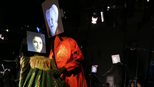 Two costumes made for the 1992 film Bram Stoker's Dracula, by designer Eiko Ishioka, showing a dress worn by the characters Mina Murray/ Elizabeth played actress Winona Ryder and the red cape worn by Count Dracula played by actor Gary Oldman on display at the Hollywood Costume exhibition at the Victoria and Albert museum in London, Tuesday, Oct. 16, 2012. Two costumes made for the 1992 film Bram Stoker's Dracula, by designer Eiko Ishioka, showing a dress worn by the characters Mina Murray/ Elizabeth played actress Winona Ryder and the red cape worn by Count Dracula played by actor Gary Oldman on display at the Hollywood Costume exhibition at the Victoria and Albert museum in London, Tuesday, Oct. 16, 2012. - Sputnik International
