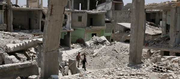 Men walk over rubble of damaged buildings in the province of Daraa, Syria July 11, 2017 Men walk over rubble of damaged buildings in the province of Daraa, Syria July 11, 2017 - Sputnik International