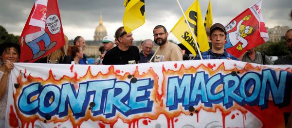 French unions gather to protest work precariousness as France's new parliament will sit for the first time at the Invalides square in Paris, France June 27, 2017. Placard reads: Against Macron French unions gather to protest work precariousness as France's new parliament will sit for the first time at the Invalides square in Paris, France June 27, 2017. Placard reads: Against Macron - Sputnik International