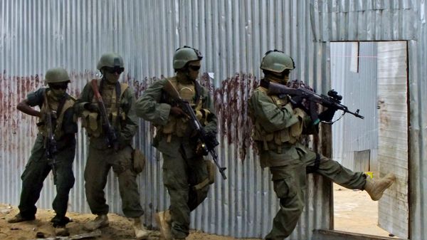(File) Masked Somali national army (SNA) soldiers search through homes for al-Shabaab fighters, during an operation in Ealsha Biyaha, Somalia, Saturday, June, 2, 2012 - Sputnik International