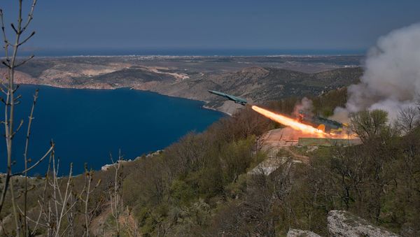 The Utyos stationary coastal missile system launches a cruise missile during a Black Sea Fleet tactical drill in Crimea - Sputnik International