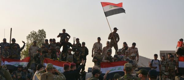 Iraqi security forces celebrate as Prime Minister Haider al-Abadi announces victory over Islamic State in Mosul, in Mosul, Iraq July 10, 2017 Iraqi security forces celebrate as Prime Minister Haider al-Abadi announces victory over Islamic State in Mosul, in Mosul, Iraq July 10, 2017 - Sputnik International