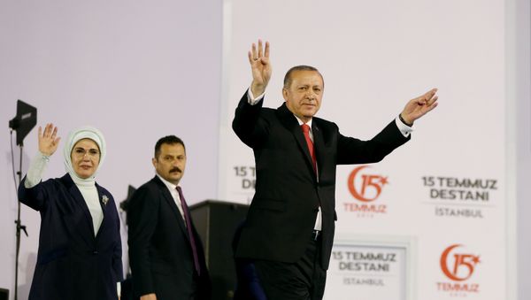 Turkish President Tayyip Erdogan and his wife Emine Erdogan greet their supporters as they arrive for a ceremony marking the first anniversary of the attempted coup at the Bosphorus Bridge in Istanbul, Turkey July 15, 2017 Turkish President Tayyip Erdogan and his wife Emine Erdogan greet their supporters as they arrive for a ceremony marking the first anniversary of the attempted coup at the Bosphorus Bridge in Istanbul, Turkey July 15, 2017 - Sputnik International