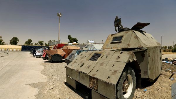 Vehicles used for suicide car bombings, made by Islamic State militants, are seen at Federal Police Headquarters after being confiscated in Mosul, Iraq July 13, 2017 - Sputnik International