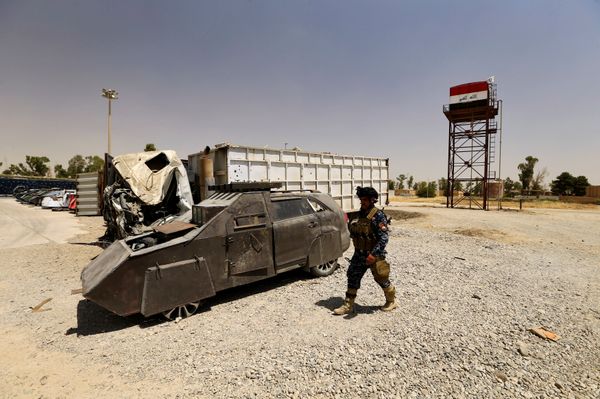 A member of Federal Police walks near vehicles used for suicide car bombings, made by Islamic State militants, at Federal Police Headquarters after being confiscated in Mosul, Iraq July 13, 2017 A member of Federal Police walks near vehicles used for suicide car bombings, made by Islamic State militants, at Federal Police Headquarters after being confiscated in Mosul, Iraq July 13, 2017 - Sputnik International