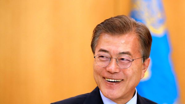 South Korean President Moon Jae-in smiles during Reuters interview in Seoul. - Sputnik International