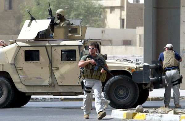 Contractors of the US private security firm Blackwater securing the site of a roadside bomb attack near the Iranian embassy in central Baghdad (File) Contractors of the US private security firm Blackwater securing the site of a roadside bomb attack near the Iranian embassy in central Baghdad (File) - Sputnik International