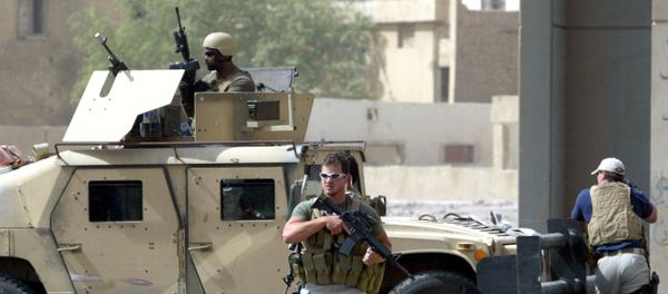 Contractors of the US private security firm Blackwater securing the site of a roadside bomb attack near the Iranian embassy in central Baghdad (File) Contractors of the US private security firm Blackwater securing the site of a roadside bomb attack near the Iranian embassy in central Baghdad (File) - Sputnik International