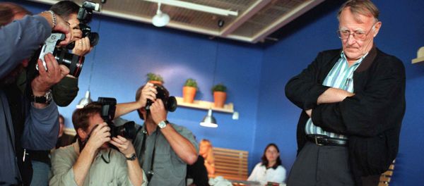 Ingvar Kamprad, founder of the Swedish furniture company Ikea, strikes a pose for the photographers at a press conference at an Ikea store in Stockholm, 17 August, to launch his new autobiography The story about Ikea. - Sputnik International