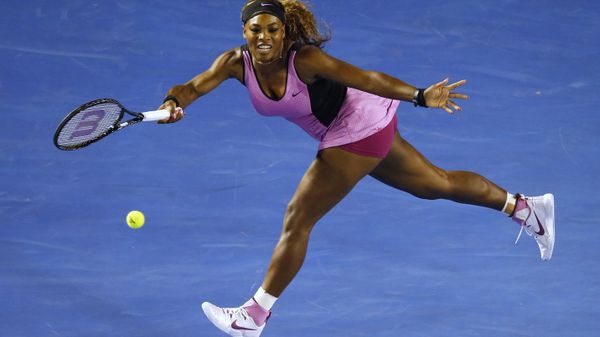 Serena Williams of the United States stretches for a return to Ashleigh Barty of Australia at the Australian Open tennis championship in Melbourne, Australia, Monday, Jan. 13, 2014. - Sputnik International