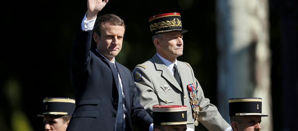 French President Emmanuel Macron and Chief of the Defence Staff French Army General Pierre de Villiers arrive in a command car for the traditional Bastille Day military parade on the Champs-Elysees in Paris, France, July 14, 2017. - Sputnik International