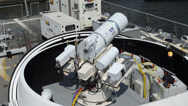 The Laser Weapon System (LaWS) temporarily installed aboard the guided-missile destroyer USS Dewey (DDG 105) in San Diego, Calif. - Sputnik International