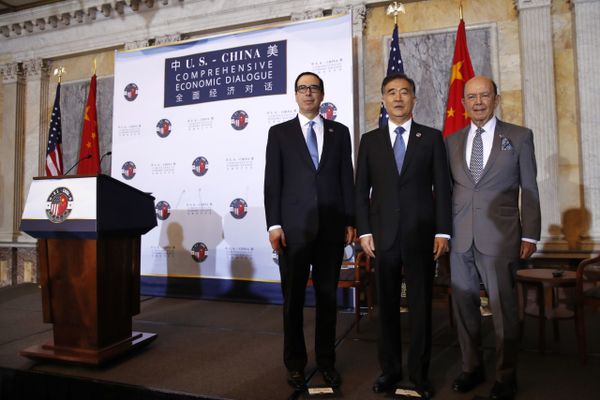 From left, Treasury Secretary Steve Mnuchin, Chinese Vice Premier Wang Yang, and Commerce Secretary Wilbur Ross pose for a group photograph before speaking at the opening of the U.S.-China Comprehensive Economic Dialogue, Wednesday, July 19, 2017, at the Treasury Department in Washington. From left, Treasury Secretary Steve Mnuchin, Chinese Vice Premier Wang Yang, and Commerce Secretary Wilbur Ross pose for a group photograph before speaking at the opening of the U.S.-China Comprehensive Economic Dialogue, Wednesday, July 19, 2017, at the Treasury Department in Washington. - Sputnik International