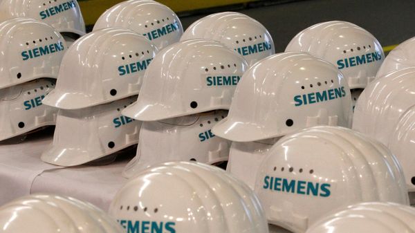 Saftey helmets are piled up for media representatives at the Siemens AG gas turbine factory hall in Berlin, Germany, November 8, 2012. - Sputnik International