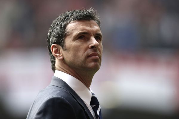 A picture taken on March 26, 2011 shows manager of Wales Gary Speed awaiting kick off against England during a Euro 2012 Group G qualifying football match at the Millenium Stadium, Cardiff, Wales. Speed was found dead at his home on November 27, 2011, the Football Association of Wales (FAW) announced - he was 42. - Sputnik International