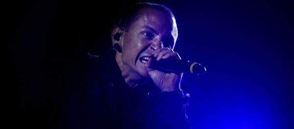 This file photo taken on May 26, 2012 shows Linkin Park's American lead singer Chester Bennington during the Rock in Rio Lisboa music festival at Bela Vista Park in Lisbon. This file photo taken on May 26, 2012 shows Linkin Park's American lead singer Chester Bennington during the Rock in Rio Lisboa music festival at Bela Vista Park in Lisbon. - Sputnik International