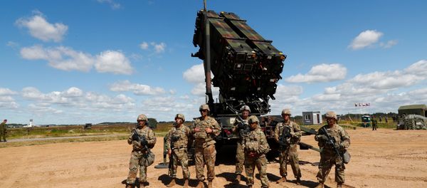 U.S. soldiers stand next to the long-range air defence system Patriot during Toburq Legacy 2017 air defence exercise in the military airfield near Siauliai, Lithuania, July 20, 2017 U.S. soldiers stand next to the long-range air defence system Patriot during Toburq Legacy 2017 air defence exercise in the military airfield near Siauliai, Lithuania, July 20, 2017 - Sputnik International