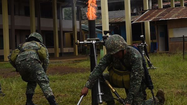 Philippine Marines fire 81mm mortars at Muslim militant positions at the frontline in Marawi, on the southern island of Mindanao on July 22, 2017 Philippine Marines fire 81mm mortars at Muslim militant positions at the frontline in Marawi, on the southern island of Mindanao on July 22, 2017 - Sputnik International