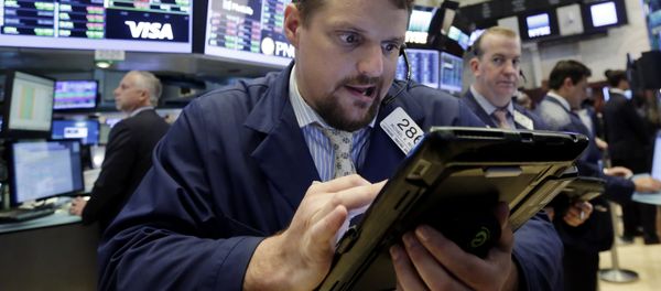 Trader Michael Milano works on the floor of the New York Stock Exchange, Thursday, July 20, 2017 Trader Michael Milano works on the floor of the New York Stock Exchange, Thursday, July 20, 2017 - Sputnik International