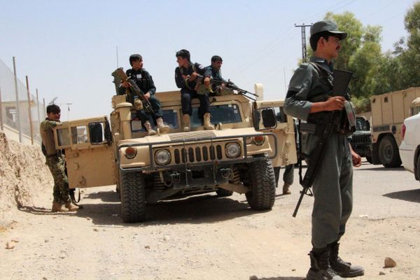 Afghan security personnel sit on atop an armoured vehicles amid an ongoing battle with Taliban militants in the Gereshk district of Helmand province on July 22, 2017 Afghan security personnel sit on atop an armoured vehicles amid an ongoing battle with Taliban militants in the Gereshk district of Helmand province on July 22, 2017 - Sputnik International