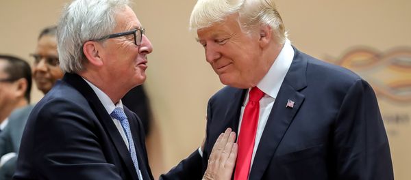 U.S. President Donald Trump, right, talks with European Commission President Jean-Claude Juncker, left, prior to a working session at the G-20 summit in Hamburg, Germany, July 8, 2017 - Sputnik International