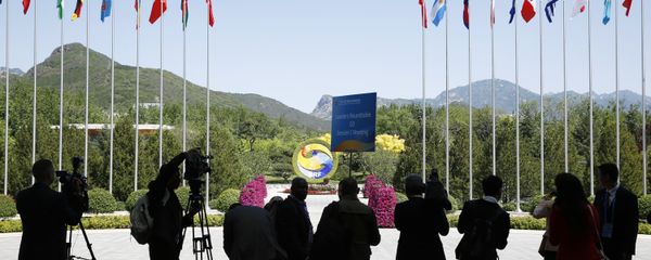 Journalist take pictures outside the venue of a summit at the Belt and Road Forum in Beijing, Monday, May 15, 2017 - Sputnik International