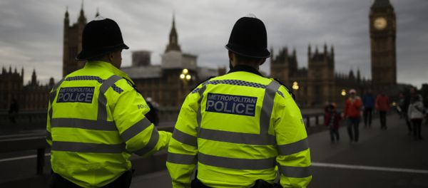 Police officers patrol Westminster Bridge with the Houses of Parliament in the background, on election day in London, Thursday, June 8, 2017. Police officers patrol Westminster Bridge with the Houses of Parliament in the background, on election day in London, Thursday, June 8, 2017. - Sputnik International