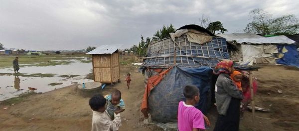 In this Friday, March 17, 2017, image made from video, people who identify themselves as Rohingya, walk at the Dar Paing camp, north of Sittwe, Rakhine state, Myanmar. More than 120,000 Rohingya were forced into camps five years ago, and their suffering may have only worsened since Nobel Peace laureate Aung San Suu Kyi rose to power in Myanmar last year. In this Friday, March 17, 2017, image made from video, people who identify themselves as Rohingya, walk at the Dar Paing camp, north of Sittwe, Rakhine state, Myanmar. More than 120,000 Rohingya were forced into camps five years ago, and their suffering may have only worsened since Nobel Peace laureate Aung San Suu Kyi rose to power in Myanmar last year. - Sputnik International