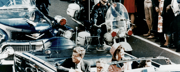 President Kennedy in the limousine in Dallas, Texas, on Main Street, minutes before the assassination. Also in the presidential limousine are Jackie Kennedy, Texas Governor John Connally, and his wife, Nellie President Kennedy in the limousine in Dallas, Texas, on Main Street, minutes before the assassination. Also in the presidential limousine are Jackie Kennedy, Texas Governor John Connally, and his wife, Nellie - Sputnik International