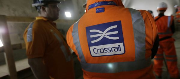 Workers talk as tunnel boring machine Victoria breaks into the eastern end of the Liverpool Street Crossrail station in London, Tuesday, March 10, 2015. - Sputnik International
