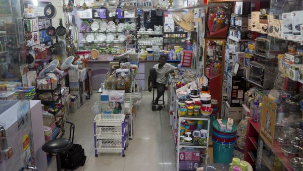 An Indian man waits for customers at a store in New Delhi, India, Saturday, July 1, 2017. An Indian man waits for customers at a store in New Delhi, India, Saturday, July 1, 2017. - Sputnik International