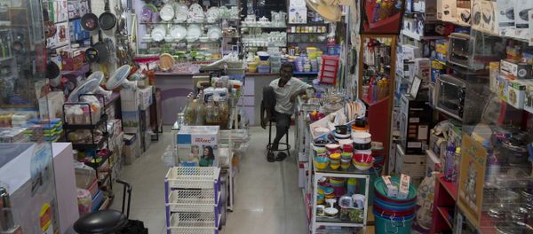 An Indian man waits for customers at a store in New Delhi, India, Saturday, July 1, 2017. - Sputnik International