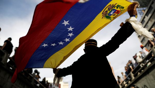 Opposition supporters attend a rally to pay tribute to victims of violence during protests against Venezuelan President Nicolas Maduro's government in Caracas, Venezuela, July 24, 2017. Opposition supporters attend a rally to pay tribute to victims of violence during protests against Venezuelan President Nicolas Maduro's government in Caracas, Venezuela, July 24, 2017. - Sputnik International