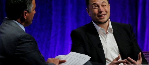 Tesla Motors CEO Elon Musk (R) answers questions from Nevada Governor Brian Sandoval during the National Governors Association Summer Meeting in Providence, Rhode Island, U.S., July 15, 2017. Tesla Motors CEO Elon Musk (R) answers questions from Nevada Governor Brian Sandoval during the National Governors Association Summer Meeting in Providence, Rhode Island, U.S., July 15, 2017. - Sputnik International