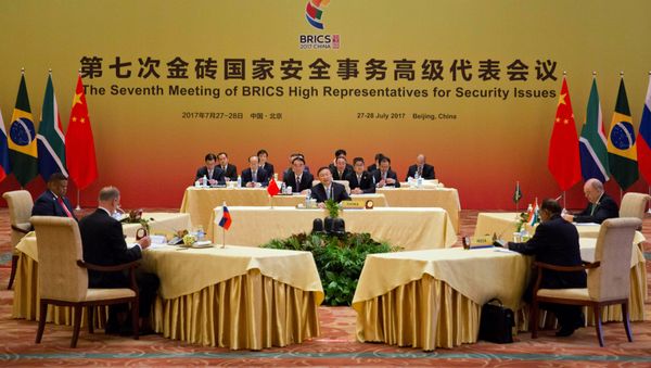 Chinese State Councilor Yang Jiechi, center hosts the seventh meeting of BRICS senior representatives on security issues held at the Diaoyutai state guesthouse in Beijing, China, Friday, July 28, 2017. Chinese State Councilor Yang Jiechi, center hosts the seventh meeting of BRICS senior representatives on security issues held at the Diaoyutai state guesthouse in Beijing, China, Friday, July 28, 2017. - Sputnik International