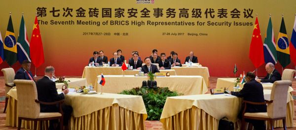 Chinese State Councilor Yang Jiechi, center hosts the seventh meeting of BRICS senior representatives on security issues held at the Diaoyutai state guesthouse in Beijing, China, Friday, July 28, 2017. - Sputnik International