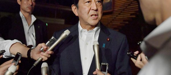 Japanese Prime Minister Shinzo Abe speaks to reporters about North Korea's missile launch in Tokyo, Japan in this photo taken by Kyodo on July 29, 2017 Japanese Prime Minister Shinzo Abe speaks to reporters about North Korea's missile launch in Tokyo, Japan in this photo taken by Kyodo on July 29, 2017 - Sputnik International