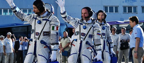 From left: ISS Expedition 52/53 primary crew members onboard engineer Paolo Nespoli of ESA, onboard engineer Sergei Ryzansky of Roskosmos space agency and ISS Expedition 53 commander Randolph Bresnik of NASA seen here ahead of the launch of Soyuz MS-05 manned spacecraft with ISS Expedition 52/53 cre - Sputnik International