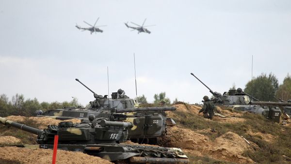 Mi-24 helicopters involved in the joint strategic exercises West-2013 by the Russian and Belarusian armed forces on the Gozhsky range, Grodno Region. (File) - Sputnik International