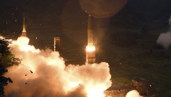 In this photo provided by South Korea Defense Ministry, South Korea's Hyunmoo II Missile system fire missiles during the combined military exercise between the U.S. and South Korea against North Korea at an undisclosed location in South Korea, Saturday, July 29, 2017. - Sputnik International